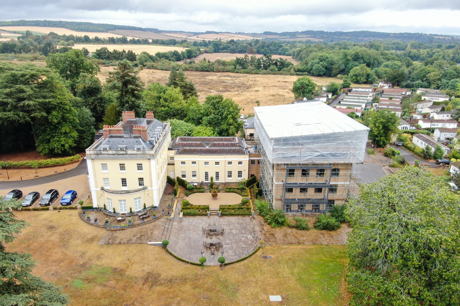 Gated Manor with Coach House - Savills Auctions