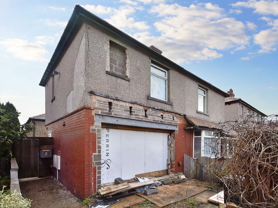 Semi-Detached Property for Redevelopment in Huddersfield - For Sale with Auction House Manchester for a Guide price of £30,000 (April 2023)