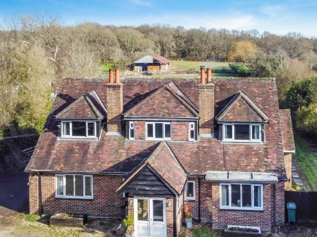 4 Bed Property in 3.44 Acres in Reigate - For Sale with Town & Country Auctions with a Guide Price of £2,300,000 (May 2023)