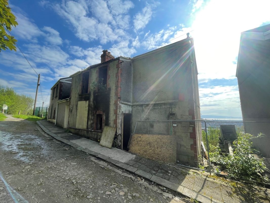 Fire Damaged Property with Sea Views in Swansea - For Sale with The Property Auction House with a Guide Price of £36,000 (June 2023)