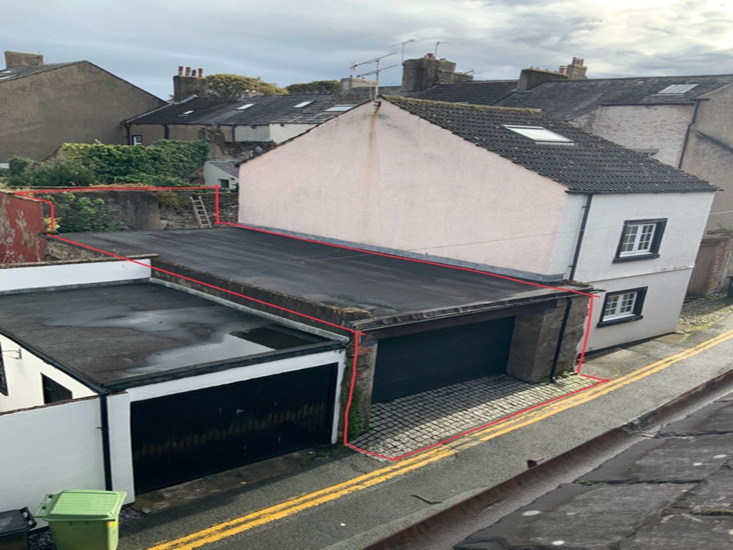Garage Site with Planning Permission in Workington - For Sale with Town & Country Property Auctions with a Guide Price of £45,000 (October 2025)